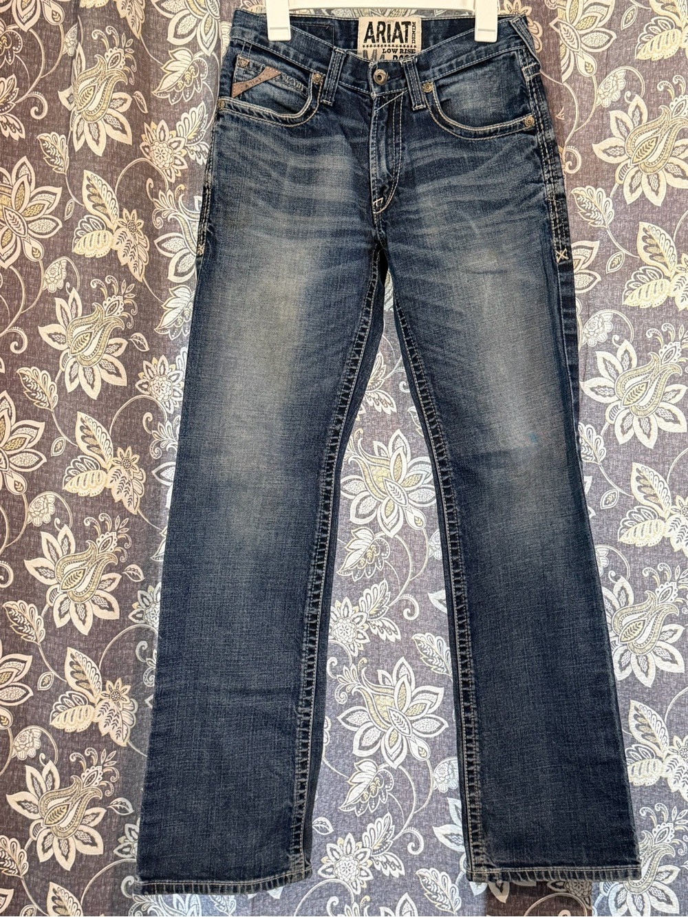 Ariat Men’s Low-Rise Boot Cut Leg Jeans - Faded Indigo. Size 28x32